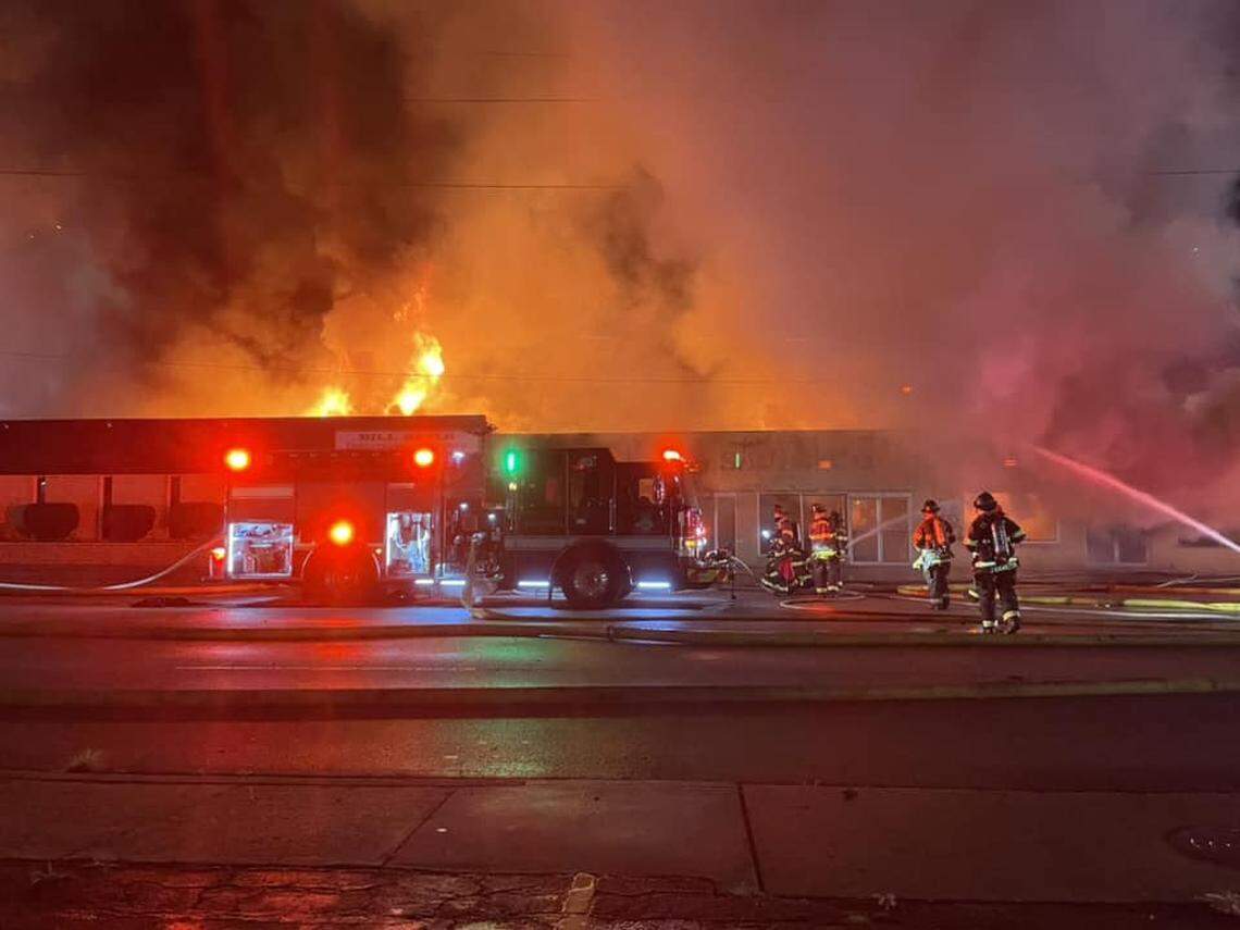 Members of the Columbia Fire Department battle a blaze.