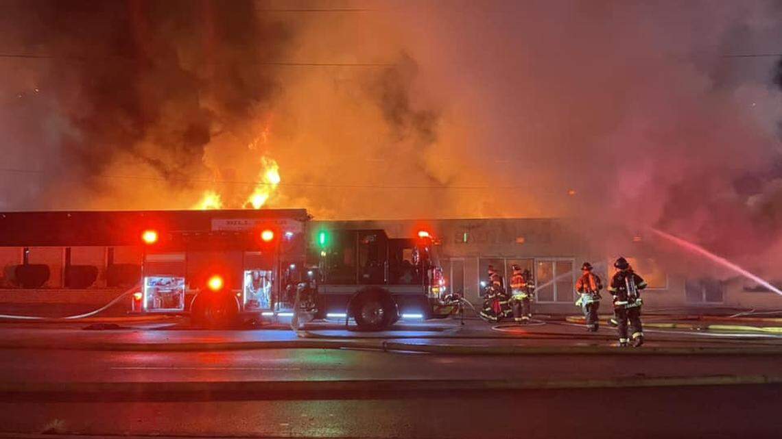 Members of the Columbia Fire Department battle a blaze.