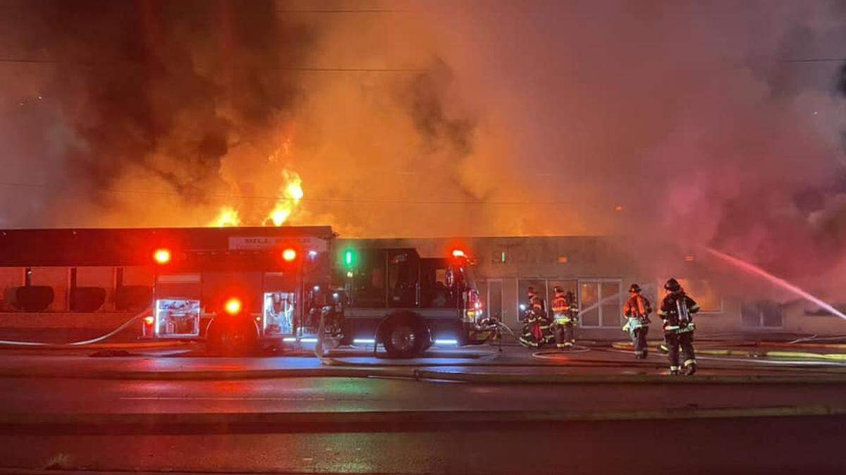 Members of the Columbia Fire Department battle a blaze.