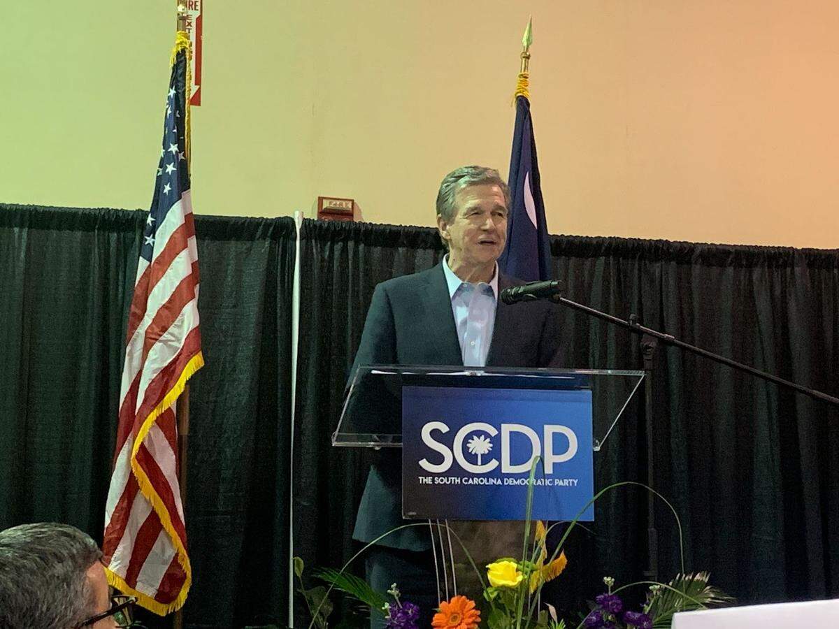 North Carolina Gov. Roy Cooper speaks at the South Carolina Blue Palmetto Bling or Jeans gathering on Friday, April 28, 2023.