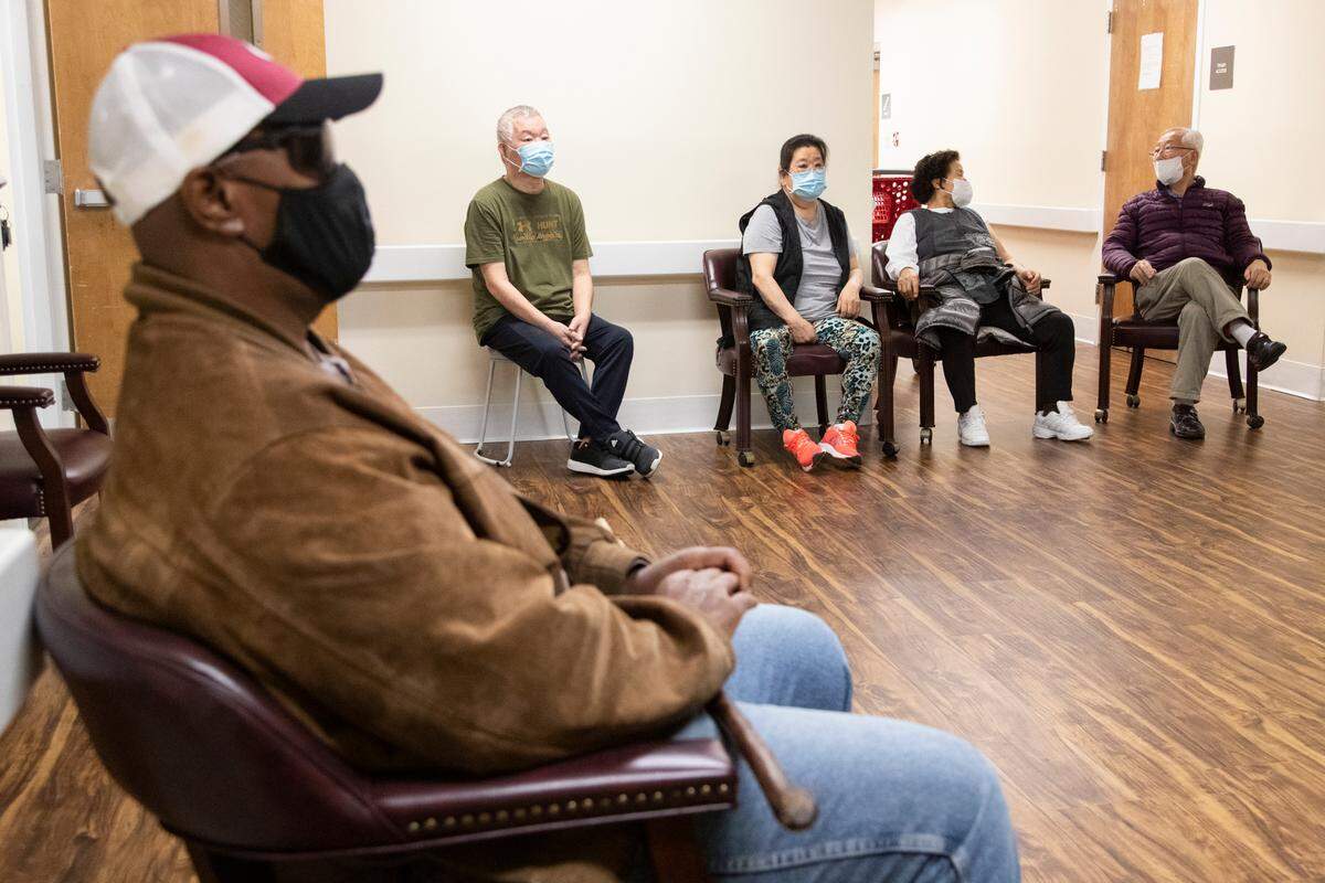 Residents at AHEPA Senior Apartments in Columbia wait to receive the first shot of a coronavirus vaccine on Saturday, Jan. 9, 2021.