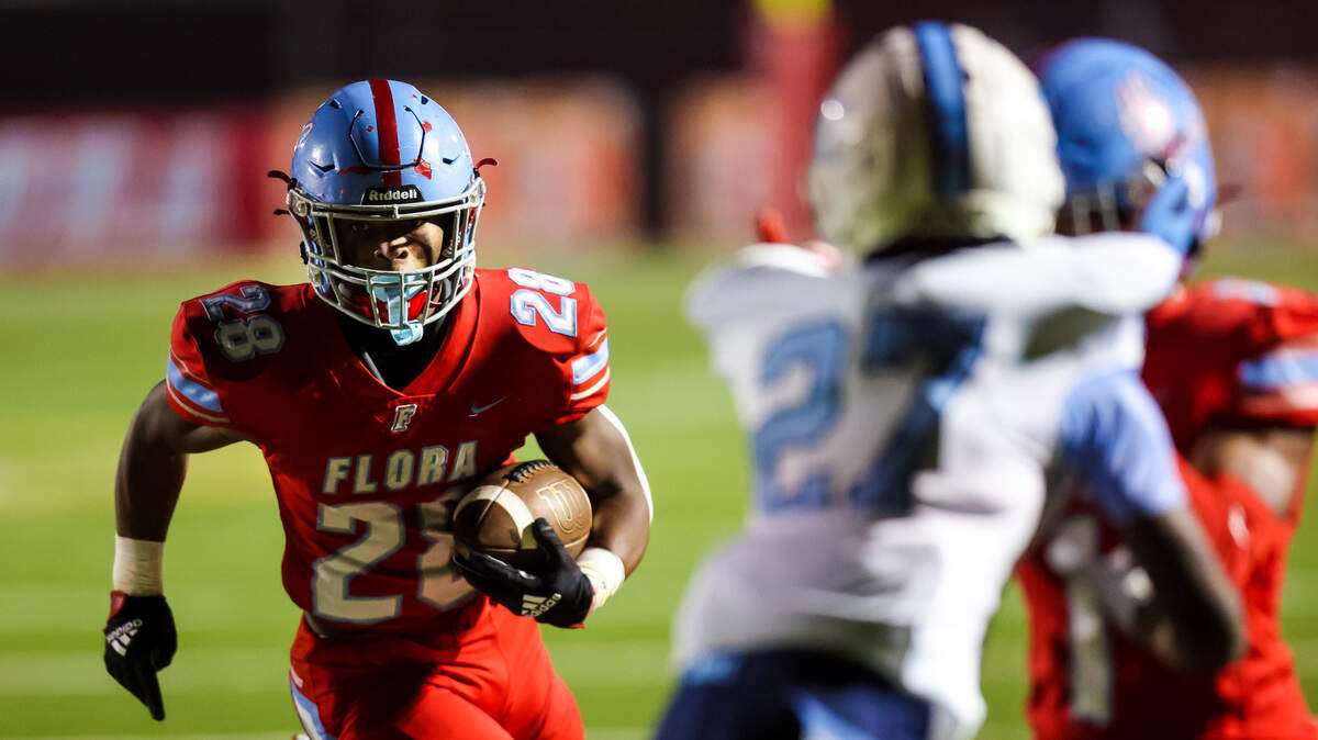 AC Flora Falcons running back Markel Townsend (28) rushes for a touchdown in the 4A Lower State Championship Game at Memorial Stadium, Nov. 25, 2022.