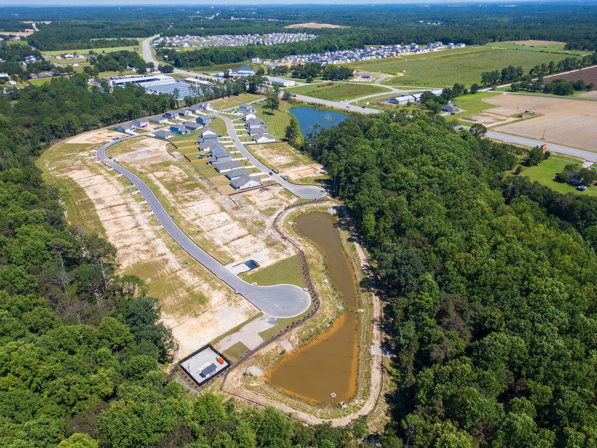 New housing, a businesses and even more housing under construction in Gilbert, South Carolina on Friday, August 29, 2025.