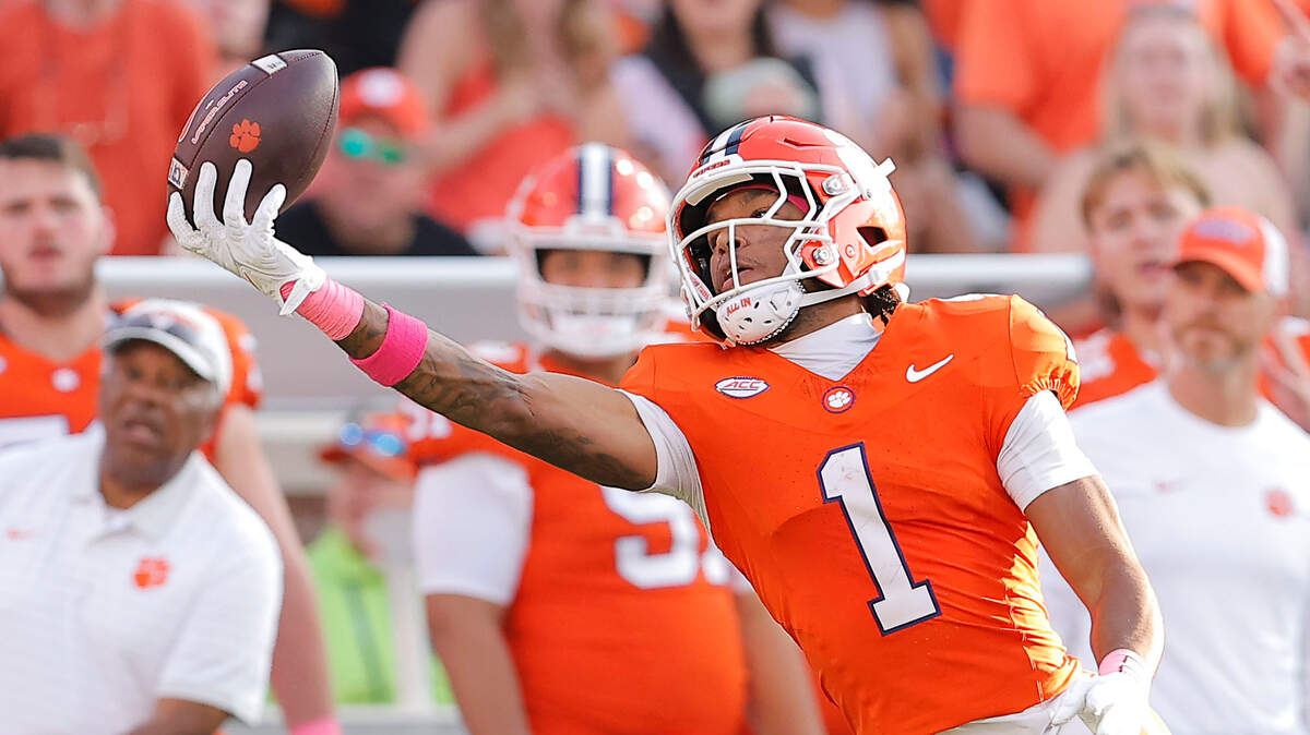 Clemson wide receiver T.J. Moore (1) reels in a touchdown catch against SMU during second-half action in Clemson, S.C on Saturday, Oct. 18, 2025.