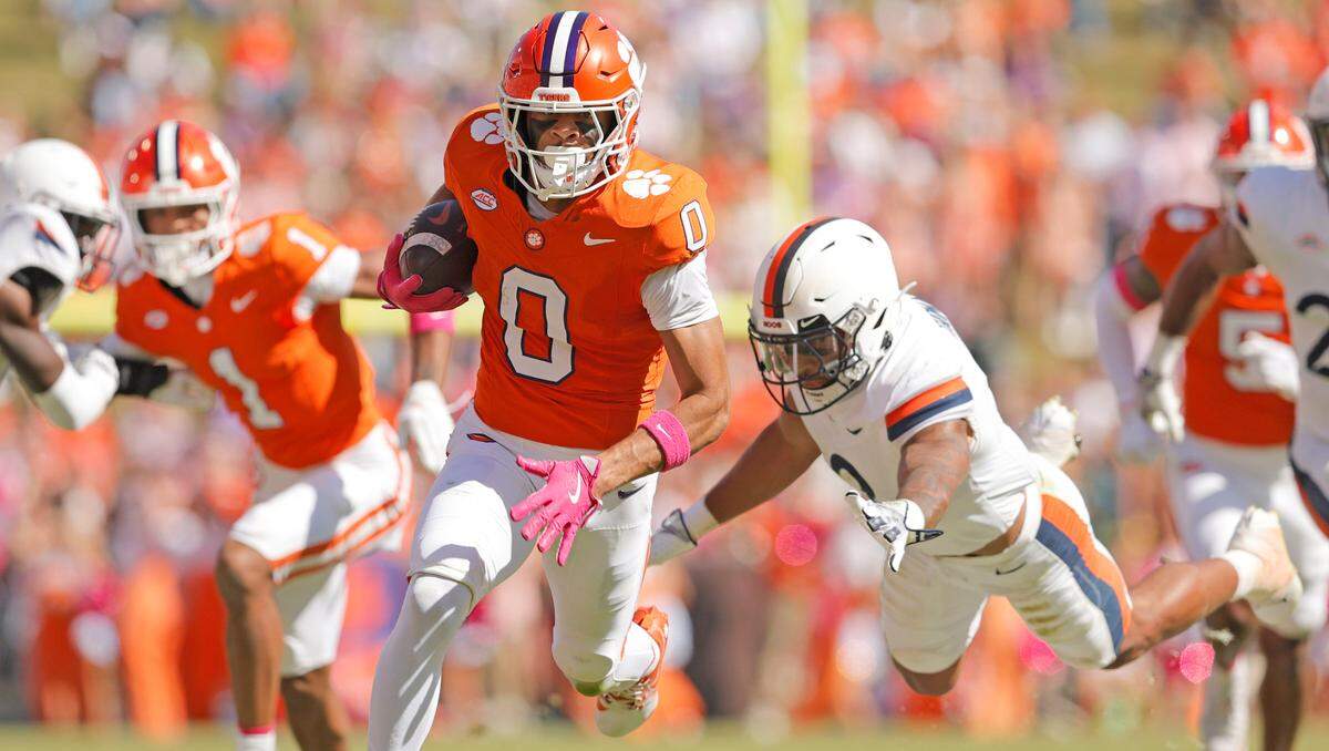 Clemson wide receiver Antonio Williams (0) blasts by Virginia on his way to a touchdown during second-half action in Clemson, S.C. on Saturday, Oct. 19, 2024.