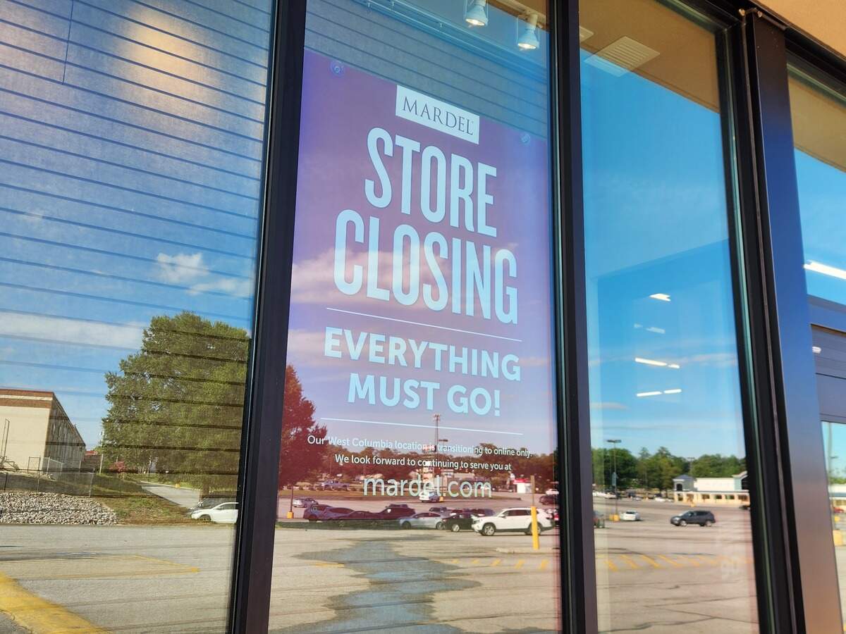 A poster in the window indicates that the Mardel Christian & Education store at 2305-A Augusta Road in West Columbia is closing.
