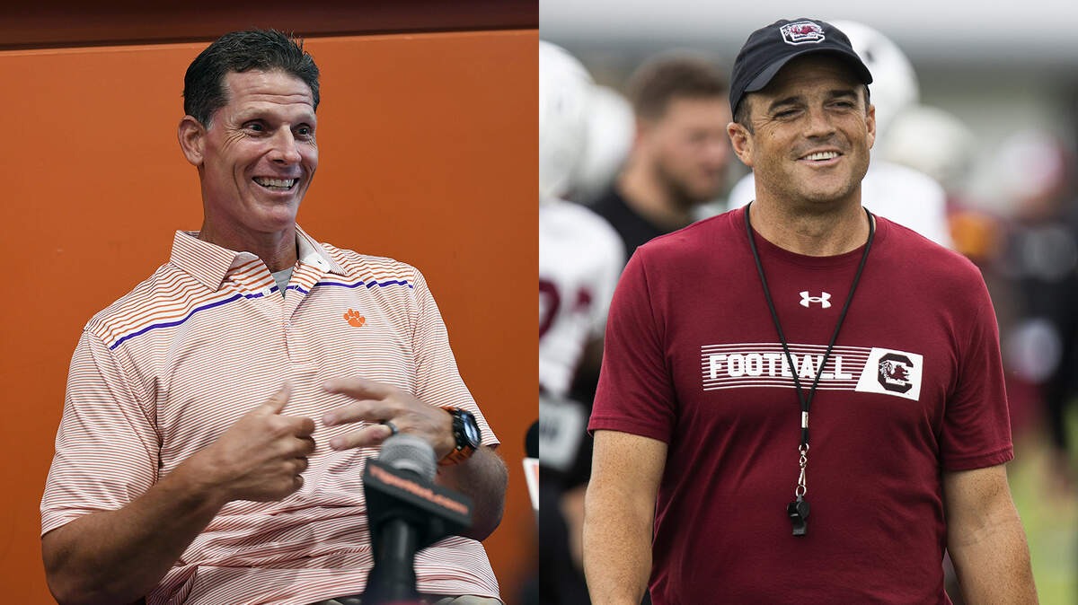 Brent Venables and Shane Beamer