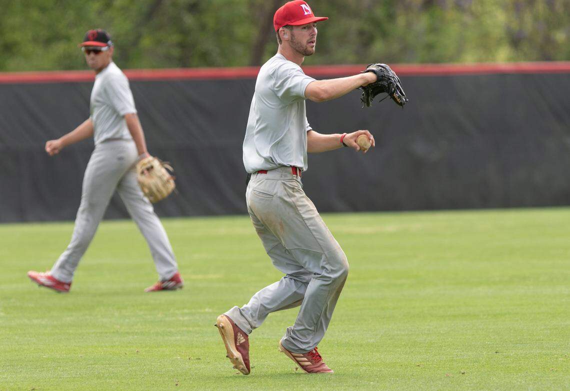 Danton Hyman, a senior centerfielder with the Newberry College baseball team, was born hearing impaired. He wears hearing aids to help him hear.