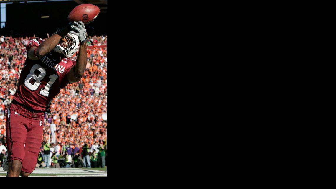 University of South Carolina WR 81 Tori Gurley hauls in a 14 yard touchdown pass against Clemson University in the second half at Williams-Brice Stadium on Saturday. South Carolina won 34-17.