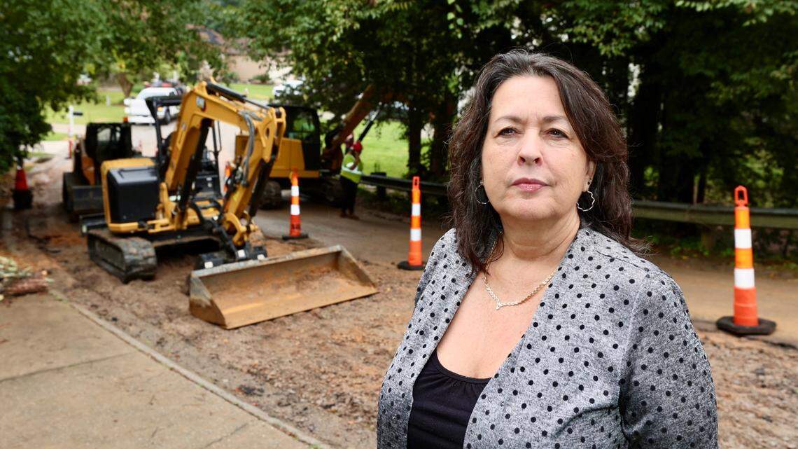 Annette Briggs lives on Willow Bend Court in Irmo where a water line was broken last week as subcontractors for Lumos Fiber were installing cable for fiber optic cable. The broken line created a sinkhole, making the road impassable.