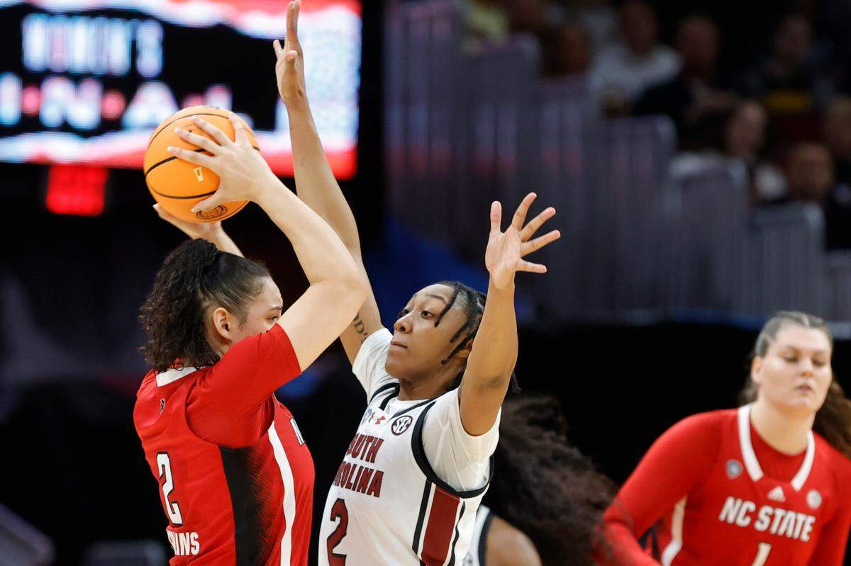 South Carolina’s Ashlyn Watkins (2) pressures NC State’s Mimi Collins (2) during the Final Four game at Rocket Mortgage FieldHouse in Cleveland, Ohio on Friday April 5, 2024.