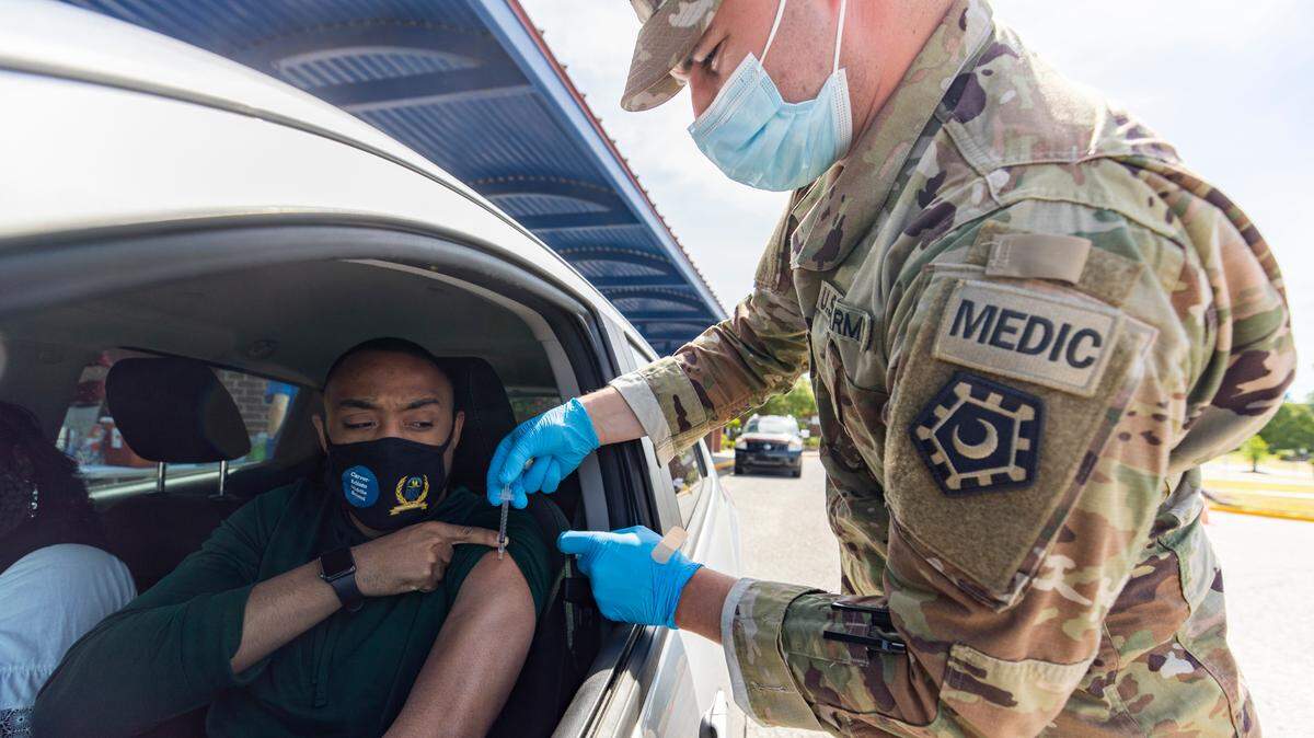 Travis Jennings receives the coronavirus vaccine at W.A. Perry Middle School on Saturday, May 22, 2021. Jennings works in Orangeburg’s public schools and wanted to protect himself and his family from the virus.