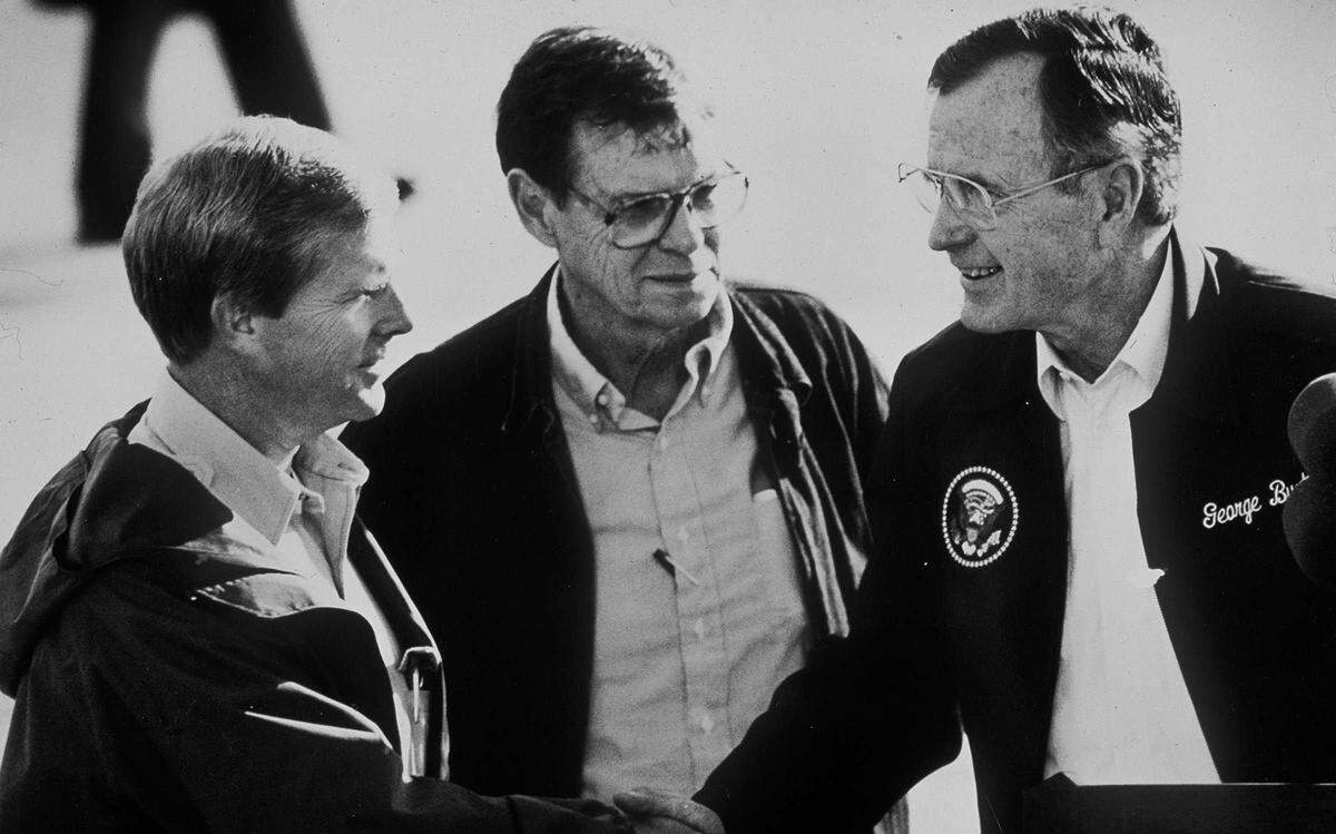 Hurricane Hugo devastated the South Carolina coastline and inland communities on September 21st and 22nd 1989. Residents spent months cleaning up after the storm. Gov. Carroll Campbell, left, Arthur Ravenel, center, greet President George Bush during his visit to inspect the damage.