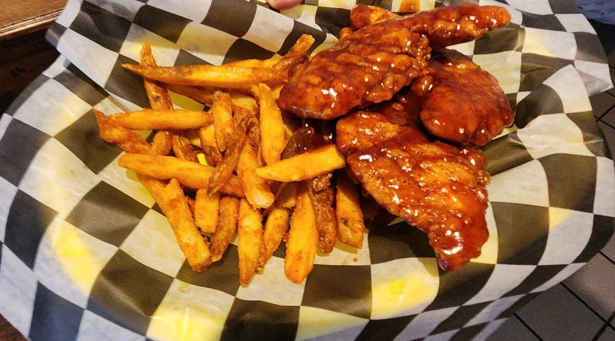 A basket of barbecue chicken tenders and fries from Big Tuna’s Kitchen & Kraft on Old Chapin Road in Lexington.
