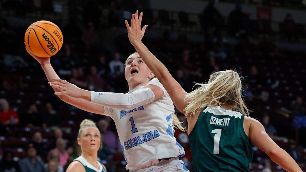 The University of North Carolina’s Aylssa Ustby is pressured by Michigan State’s Tory Ozment (1) during the first half of action in the first round of the NCAA Tournament at the Colonial Life Arena in Columbia, SC, on Friday, Mar. 22, 2024