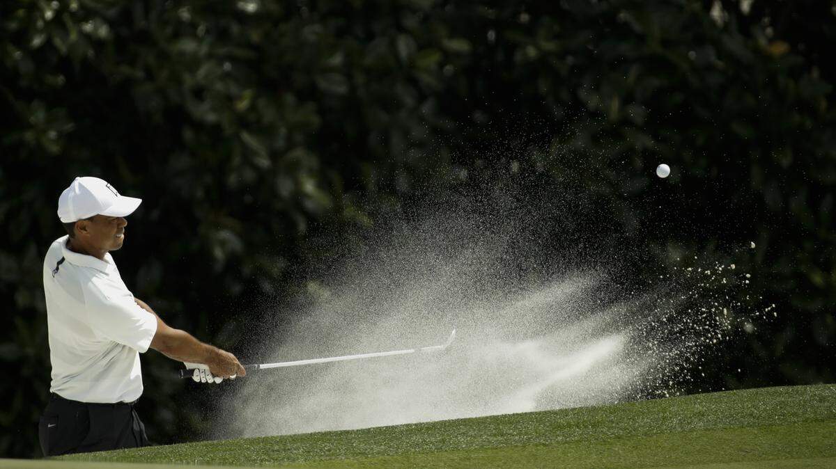 Tiger Woods hits from a bunker on the fifth hole during the second round at the Masters golf tournament Friday, April 6, 2018, in Augusta, Ga. (AP Photo/Chris Carlson)