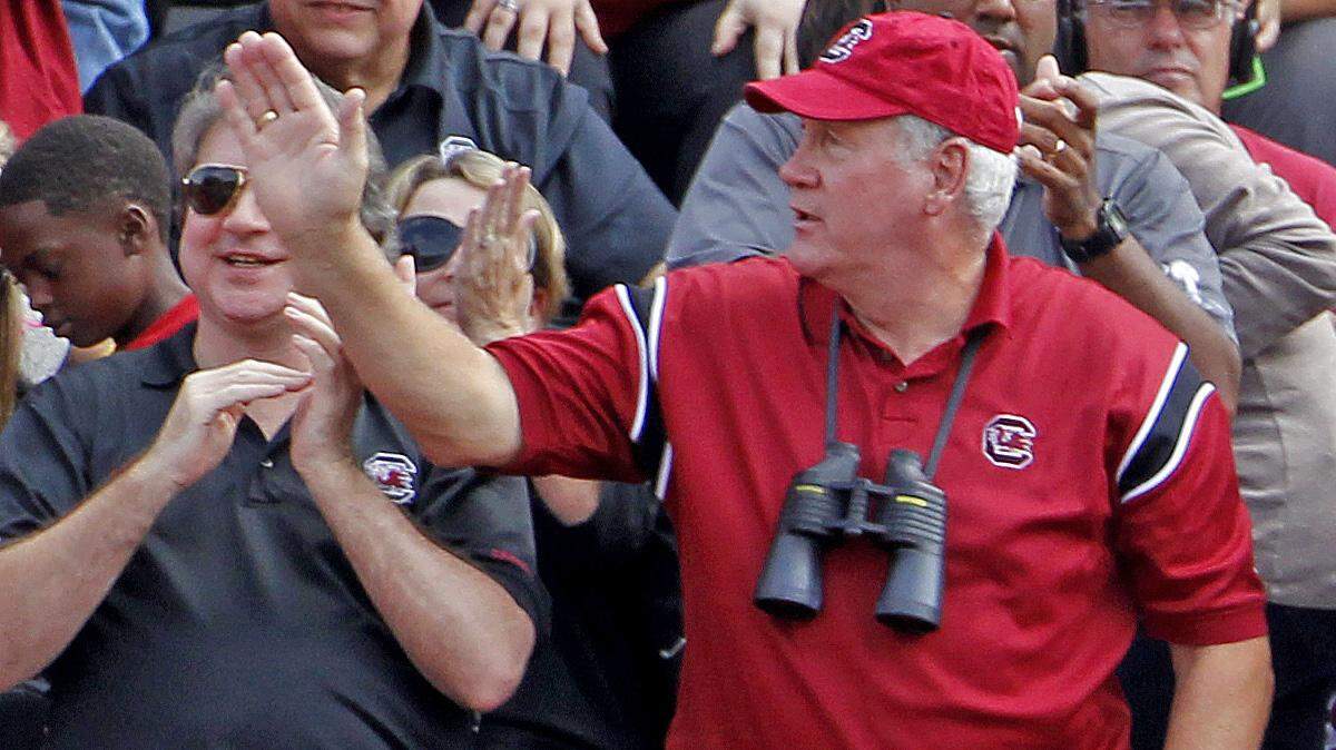South Carolina fans celebrate a touchdown by wide receiver Bruce Ellington (23) in the first half against Arkansas at Donald W. Reynolds Razorback Stadium, Saturday, October 12, 2013. 
