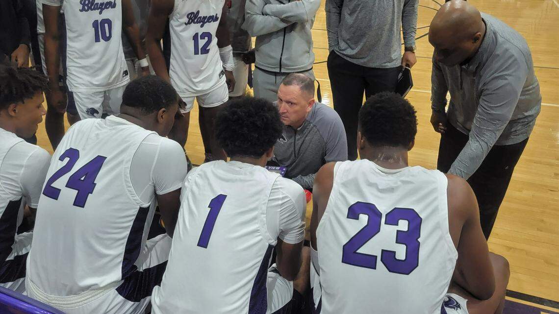 Ridge View boys basketball coach Yerrick Stoneman talks to his team during a timeout on Thursday on the first day of The Bash at Ridge View HS in Columbia, SC.