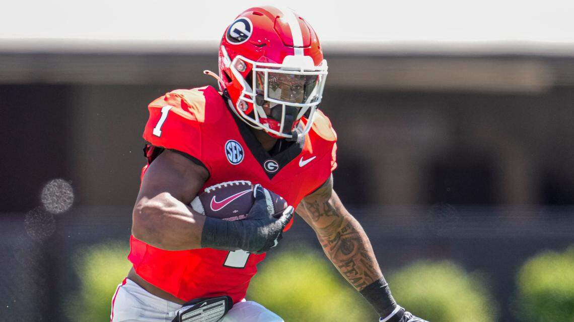 Apr 13, 2024; Athens, GA, USA; Georgia Bulldogs running back Trevor Etienne (1) runs with the ball during the G-Day Game at Sanford Stadium.