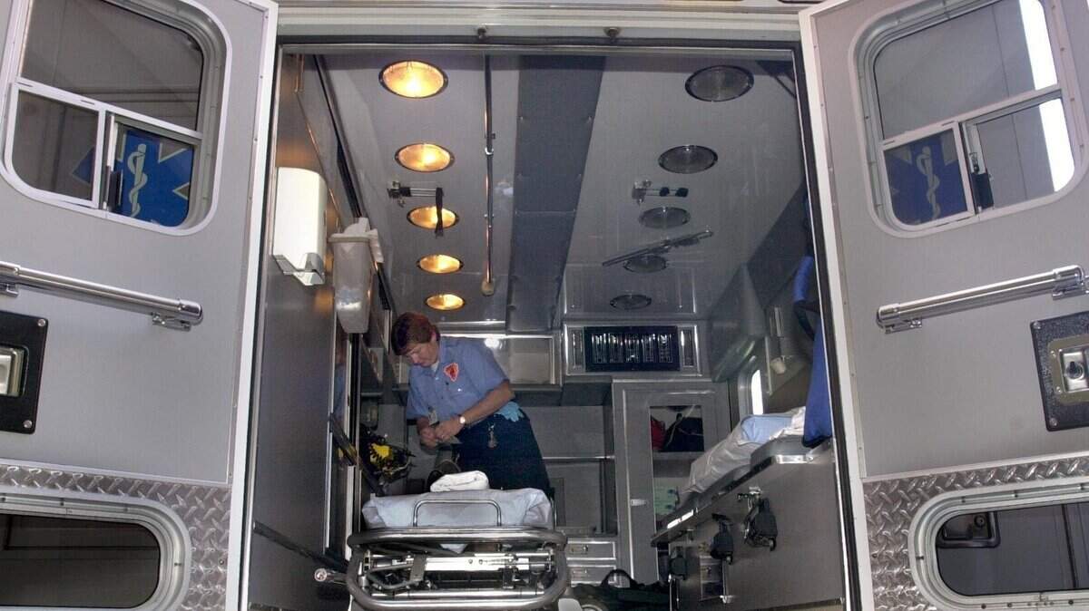 Lexington County Emergency Medical Technician Tammy Rollings restocks an ambulance after making a run. While Rollings is taking classes to become an Intermediate Emergency Medical Technician, she is representative of the growing numbers of emergency personnel lacking advanced training working on ambulances in Lexington County. Shot on 11/06/01 Tracy Glantz/The State 920-2030