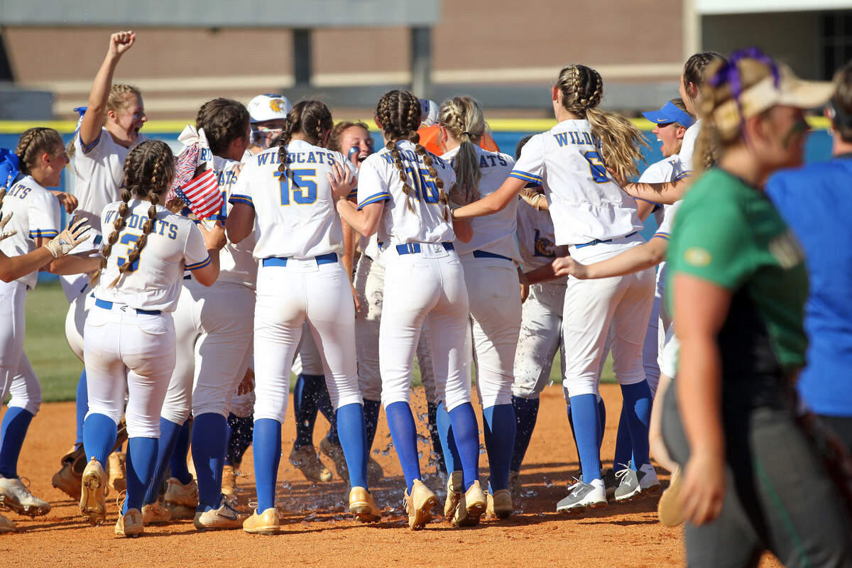 Lexington softball celebrates a walk-off win Tuesday over Summerville.