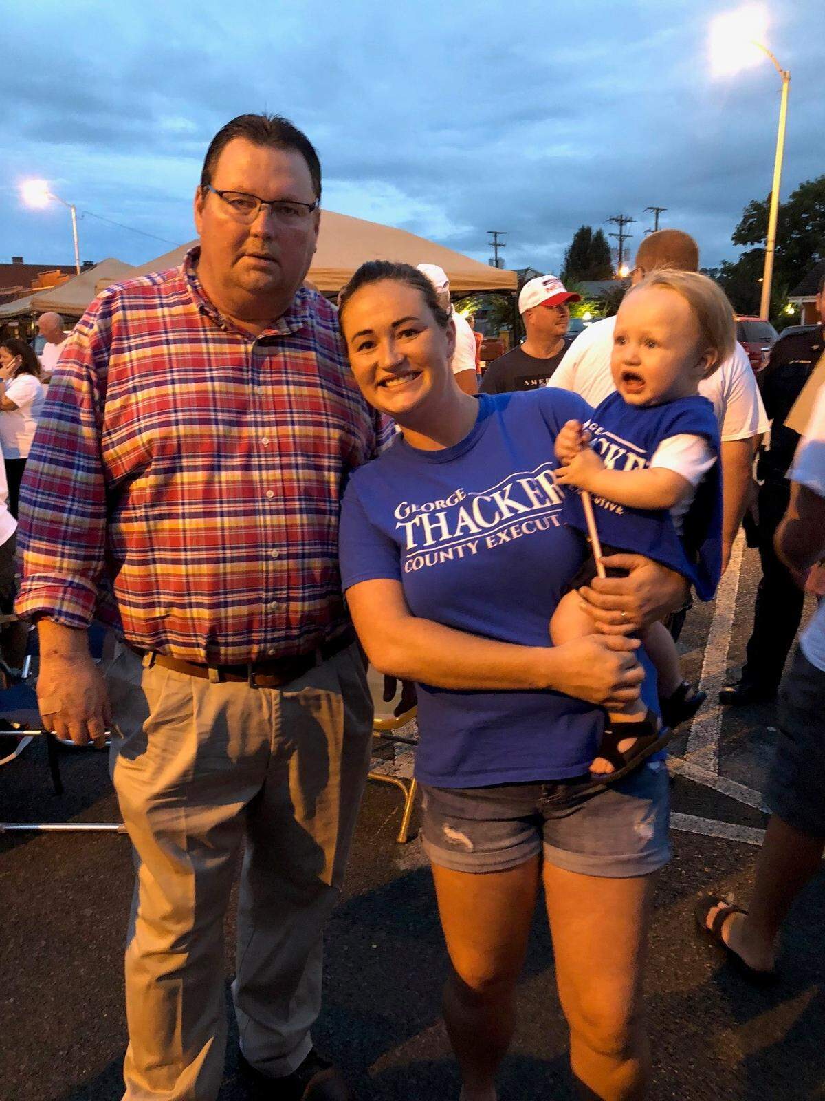 George Thacker, pictured with his daughter and grandchild, died while in custody at the federal prison camp in Edgefield, S.C. on December 26, 2022.