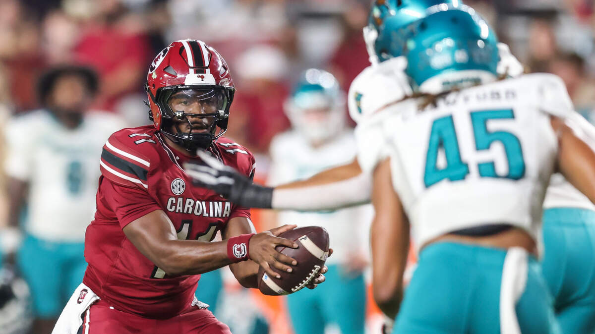 South Carolina quarterback Air Noland (11) looks to hand off the ball during second half of the Gamecocks’ game against Coastal Carolina at Williams-Brice Stadium in Columbia on Saturday, November 22, 2025.