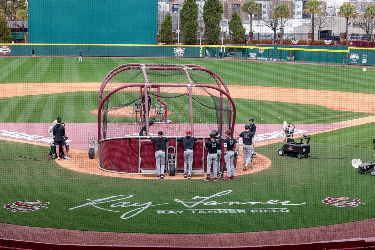 Ray Tanner’s signature is painted on the field during practice on Thursday Feb. 13, 2025. Tanner will be recognized with a dedication ceremony naming the field after him during the opening series. Tanner coached baseball at USC for 16 years, winning two National Championships.