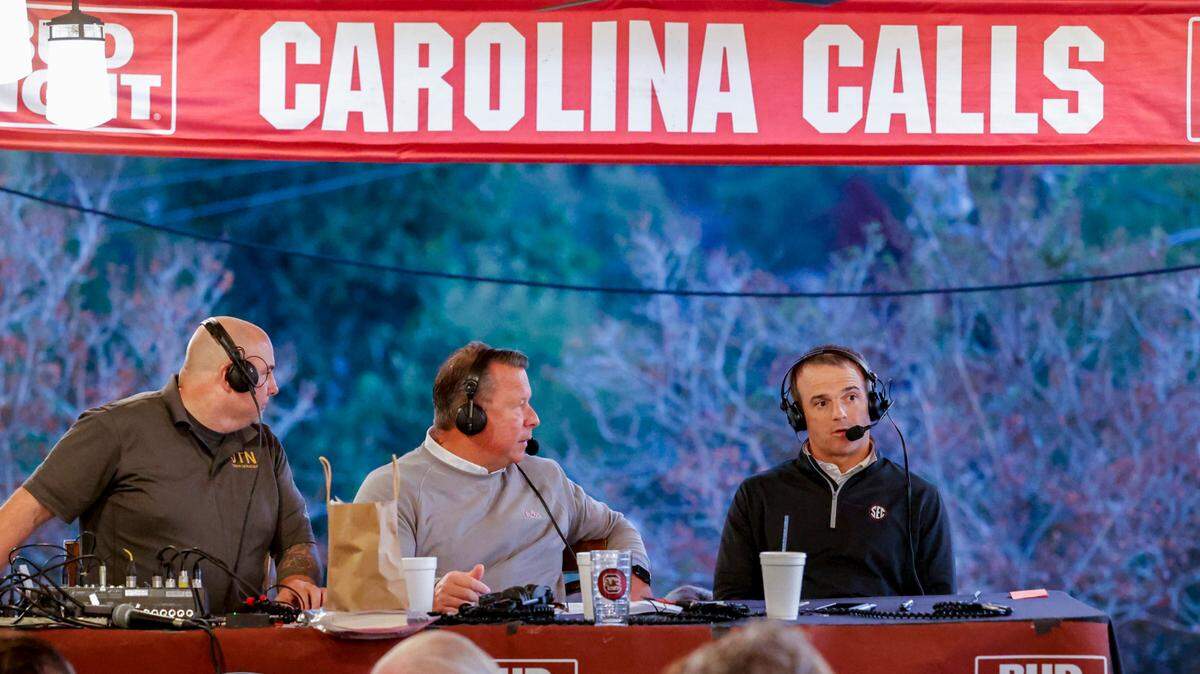File photo: South Carolina football coach Shane Beamer and talk-show host Todd Ellis participate in The Carolina Calls Show live at Backstreets Grill