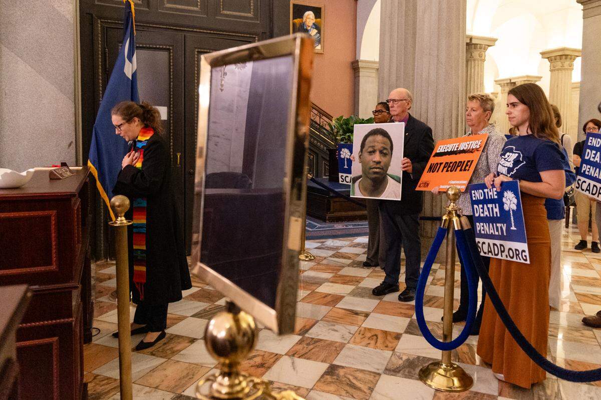 Activists who oppose the death penalty present South Carolina Governor Henry McMaster’s office with a petition to grant Freddie Owens clemency on Thursday, September 19, 2024.