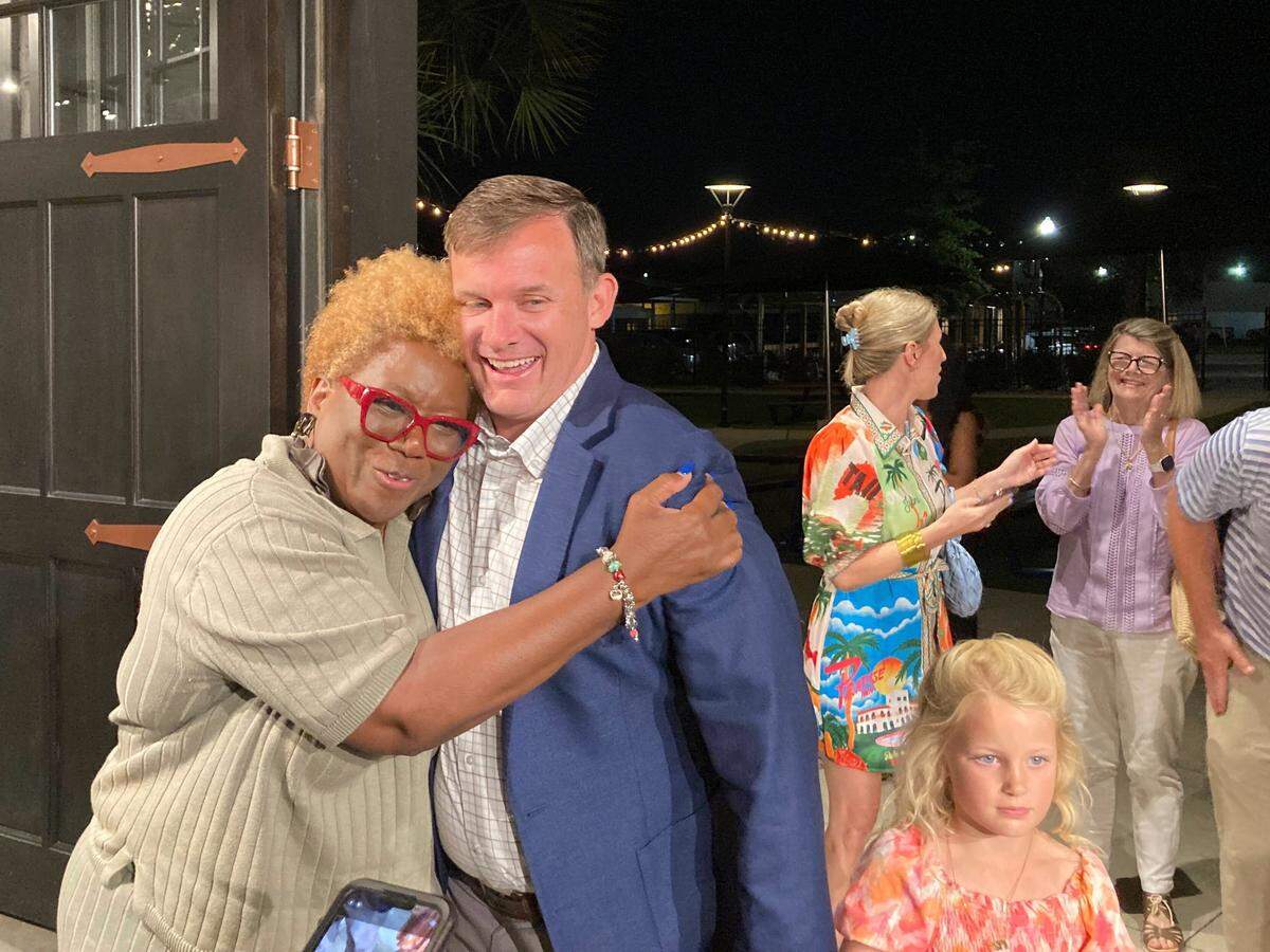 Russell Ott is congratulated after declaring victory in the senate District 26 race against incumbent Dick Harpootlian on Tuesday, June 11, 2024.