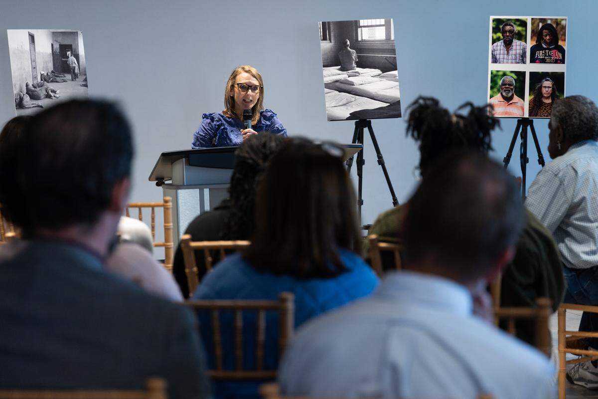 Able SC president Kimberly Tissot speaks at an opening of an exhibit focusing on the survivors of the former South Carolina State Hospital on Tuesday, March 24, 2026. While the Bull Street development has brought economic activity to the area, Able SC hopes the history of involuntary commitment and medical neglect is not forgotten. 