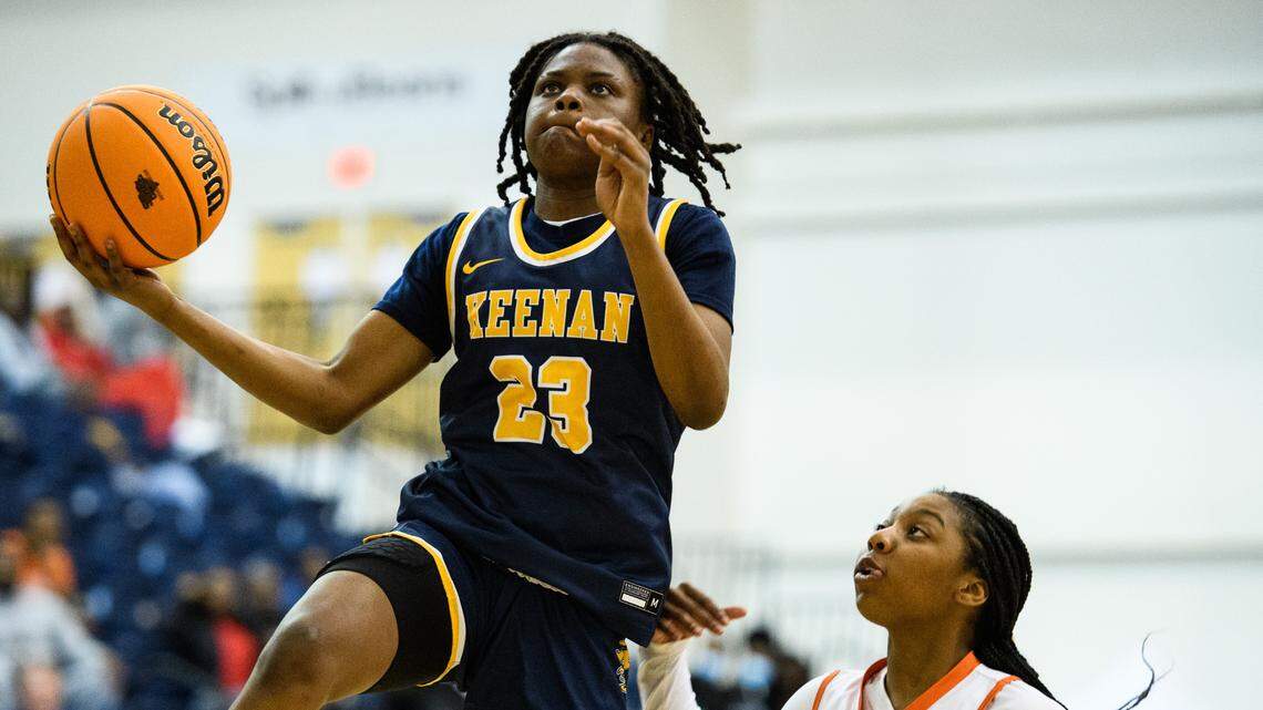 Keenan’s MiLaysia Fulwiley (23) attempts to score a layup after evading Southside’s Jaila Young (12) during their Class 3A Upper State Championship game Monday, Feb. 28, 2022.