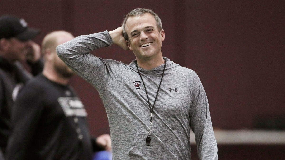 South Carolina Gamecocks head coach Shane Beamer watches his team practice football on Thursday, March 31, 2022.