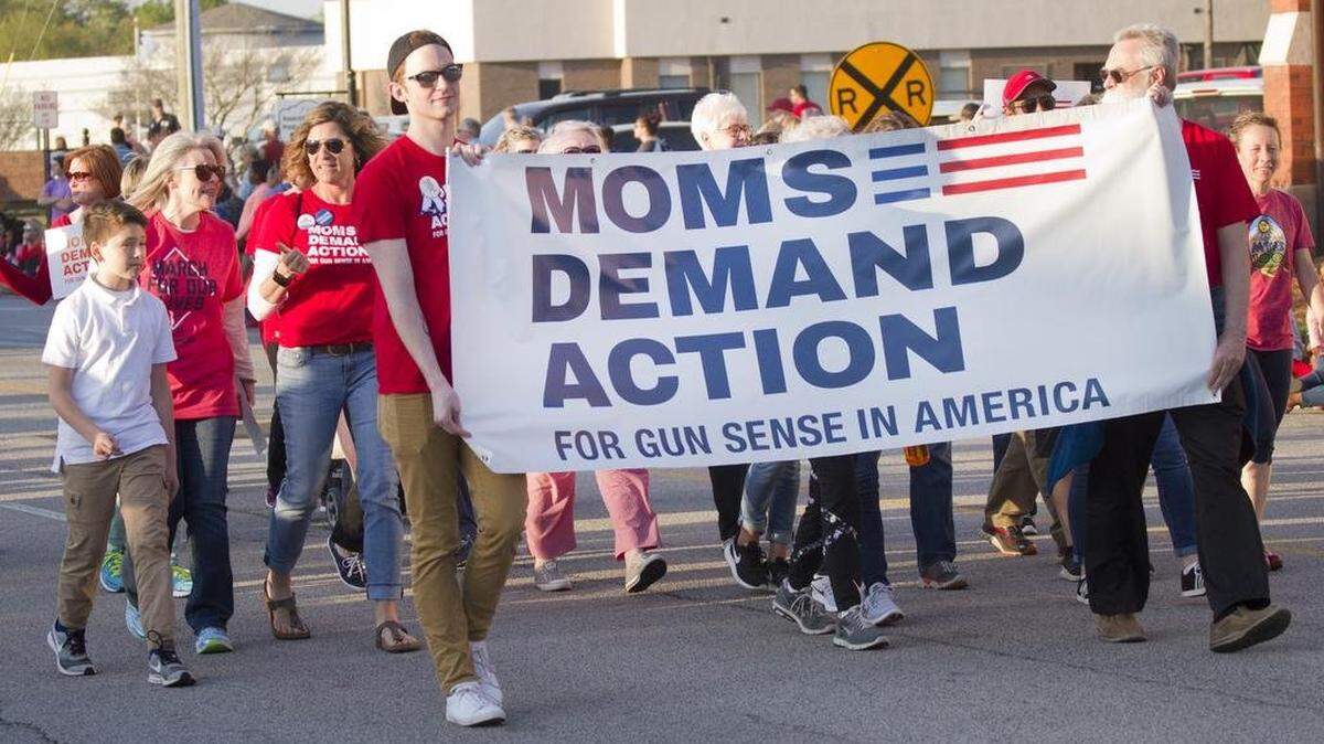 In this 2018 file photo, A local Moms Demand Action for Gun Sense in America group marches in the Come-See-Me Festival parade in Rock Hill.