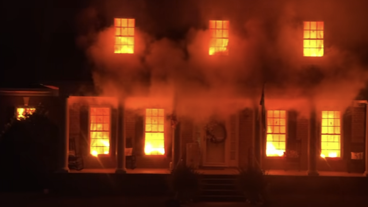 Fountain Inn SC couple has decorated their house to look like its on fire for Halloween.
