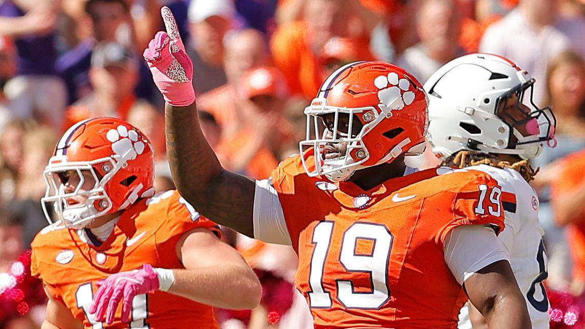 Clemson defensive tackle DeMonte Capehart (19) celebrates a big hit against Virginia in Clemson, S.C. on Saturday, Oct. 19, 2024