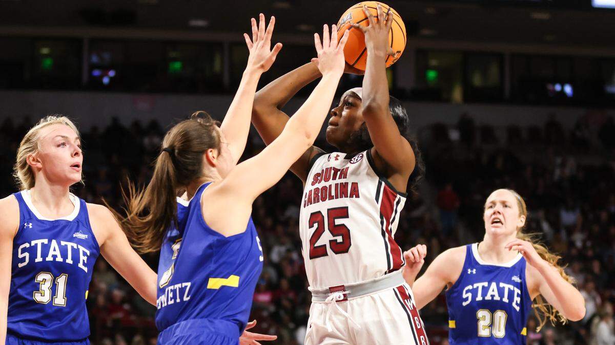 South Carolina guard Raven Johnson (25) puts up a shot over South Dakota State guard Madison Mathiowetz (3) during the first half of the Gamecocks’ game at Colonial Life Arena in Columbia on Monday, November 20, 2023.