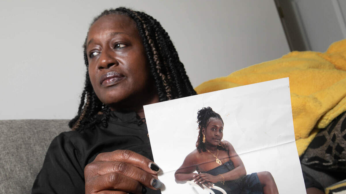 Terronda Nielson holds a photograph of her daughter, Brittany Scott. Scott, who was seven-months pregnant at the time, was the victim of a shooting. She was placed on life-support to complete her pregnancy