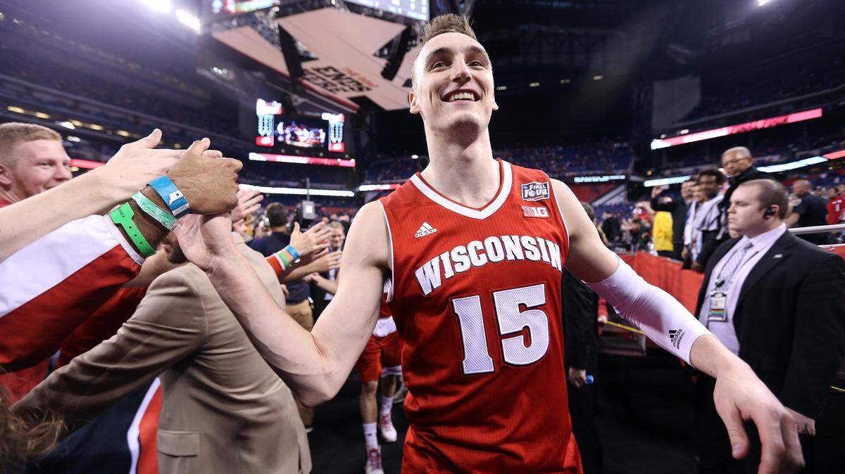 From April 4, 2015: Sam Dekker #15 of the Wisconsin Badgers celebrates after defeating the Kentucky Wildcats during the NCAA Men's Final Four Semifinal at Lucas Oil Stadium in Indianapolis, Indiana.
