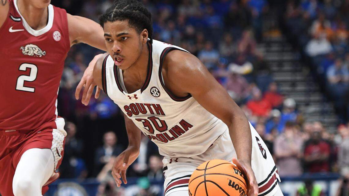 Mar 14, 2024; Nashville, TN, USA; South Carolina Gamecocks forward Collin Murray-Boyles (30) drives to the basket against Arkansas Razorbacks forward Trevon Brazile (2) during the first half at Bridgestone Arena. Mandatory Credit: Christopher Hanewinckel-USA TODAY Sports