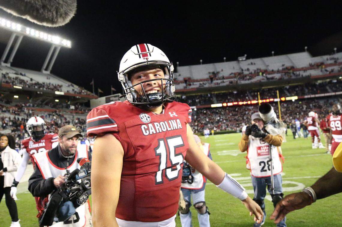 South Carolina quarterback Jason Brown (15) walks off the field after leading the Gamecocks to a win over Florida on Saturday, Nov, 6, 2021 at Williams-Brice Stadium.