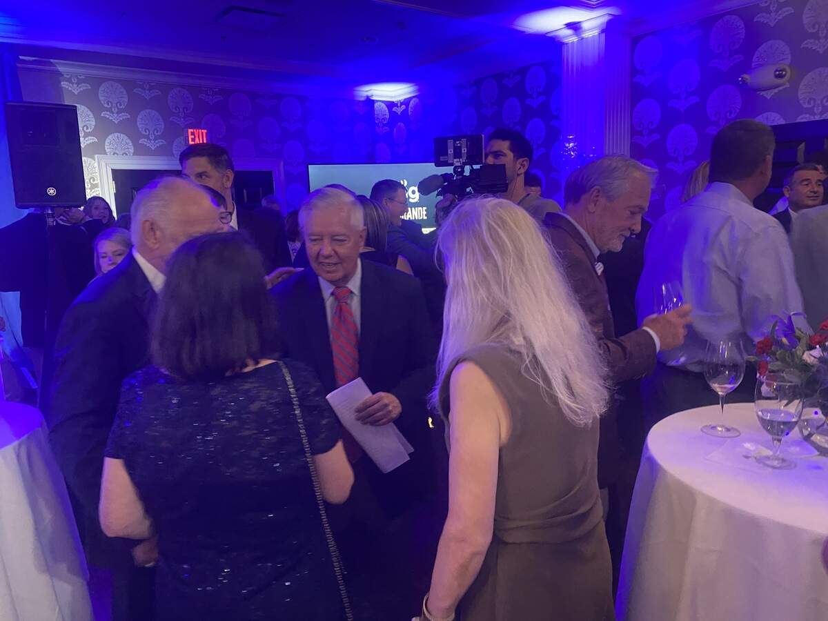 Sen. Lindsey Graham shakes hands with supporters after winning the Republican nomination. He celebrated the night at the Palmetto Club in downtown Columbia.