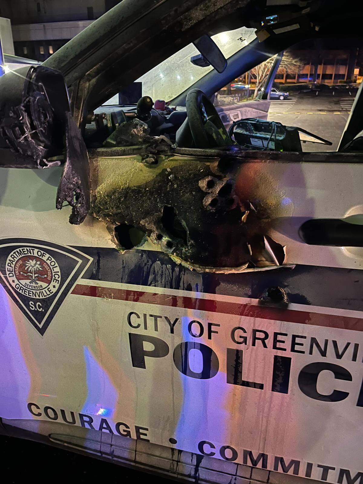 Damage to a Greenville, S.C., police vehicle after it was shot with an unidentified incendiary device early Sunday, Jan. 11, 2026.