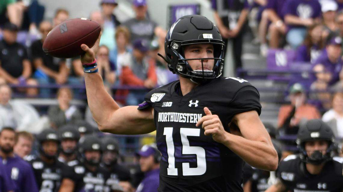Northwestern quarterback Hunter Johnson (15)