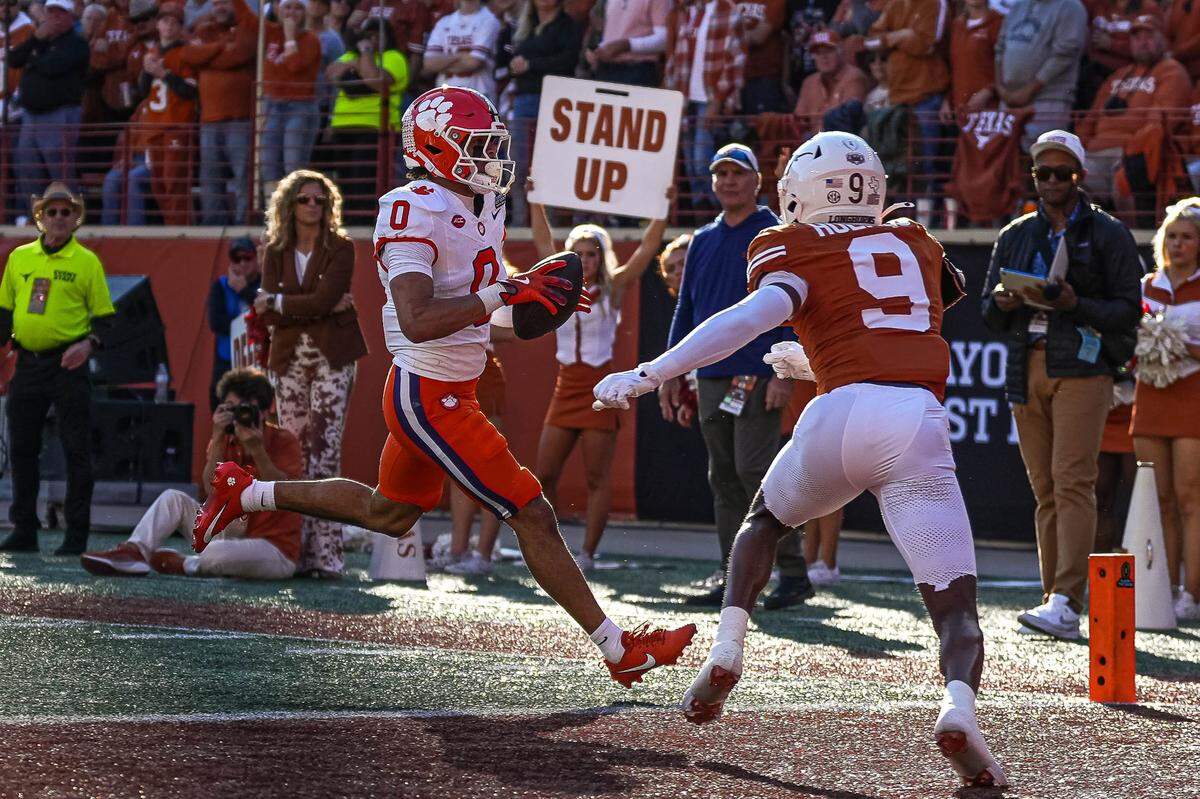 Clemson receiver Antonio Williams (0) runs the ball in for a touchdown during the game against the Texas Longhorns in the first round of the College Football Playoffs at Darrell K Royal-Texas Memorial Stadium on Saturday, Dec. 21, 2024.