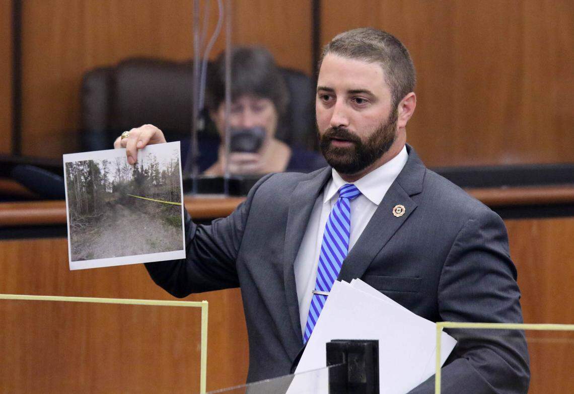 SLED investigator Todd Shank shows the jury a photograph of Black Bottom Road during the trial of Nathaniel Rowland on Wednesday, July 21, 2021 in Richland County Circuit Court. The location in Clarendon County is where hunters found Samantha Josephson.