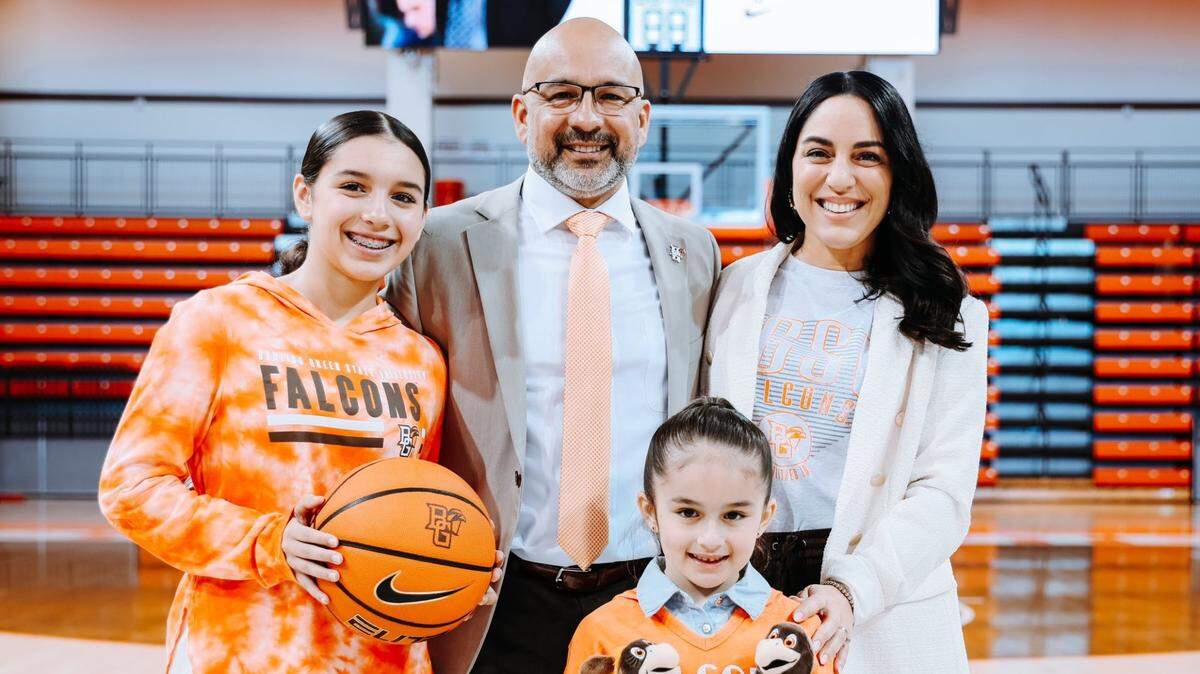 Former South Carolina women’s basketball assistant Fred Chmiel poses for a photo with his wife and family on Monday. Chmiel was introduced as new Bowling Green women’s basketball coach on Monday.