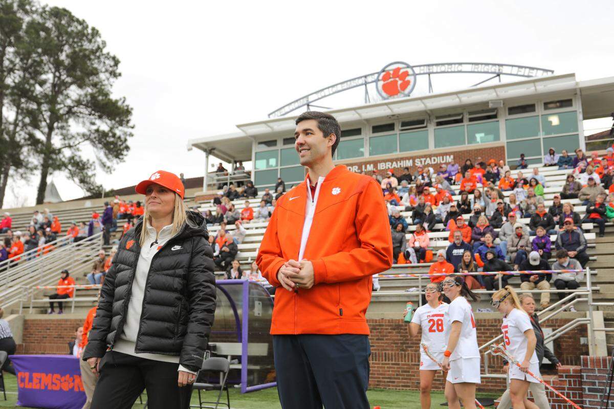 Clemson women’s lacrosse head coach Allison Kwolek and director of athletics Graham Neff prior to the inaugural game against the Wofford Terriers on Saturday at Historic Riggs Field.