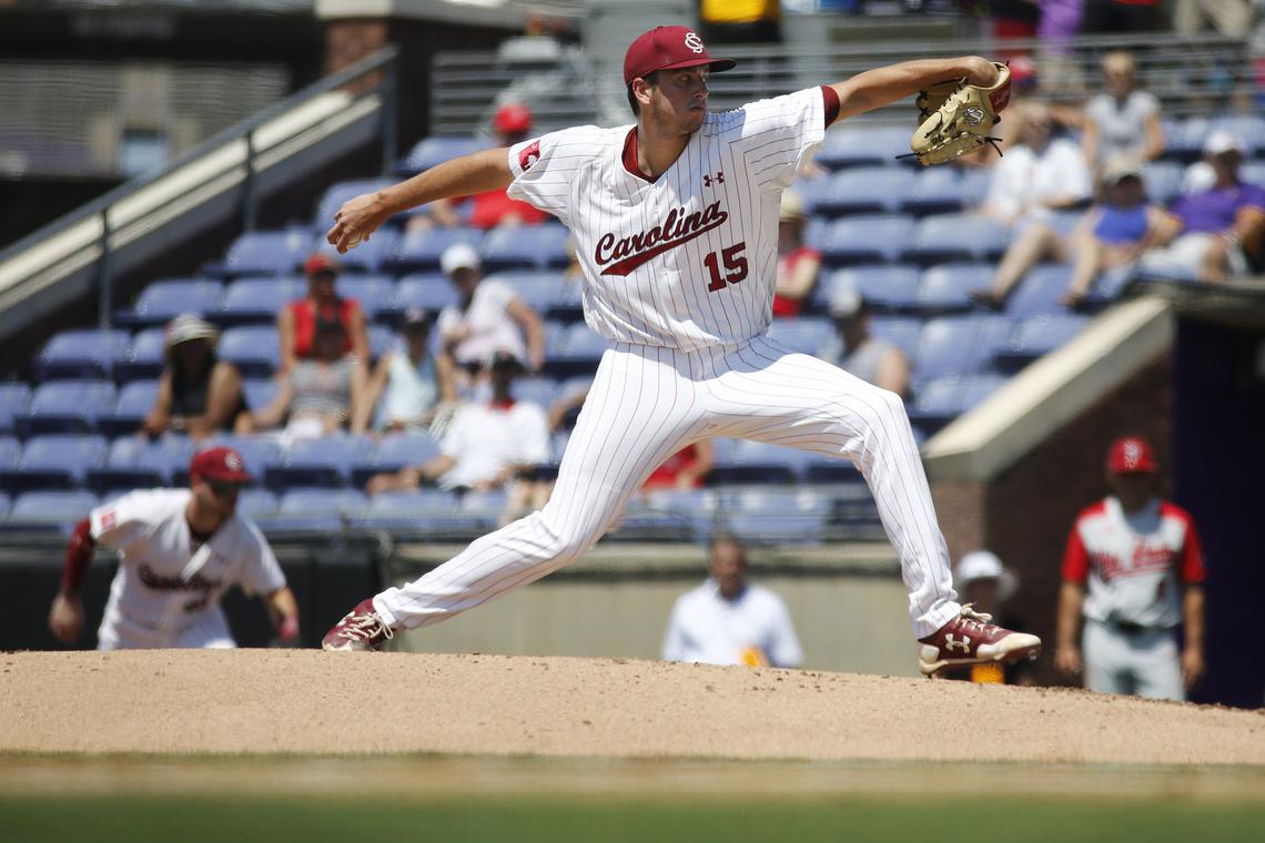 South Carolina pitcher Adam Hill (15) throws a pitch in the third inning of the 2018 NCAA baseball tournament Greenville Regional at Clark-LeClair Stadium, in Greenville, NC, Friday, June 1, 2018. (Eamon Queeney for The State)